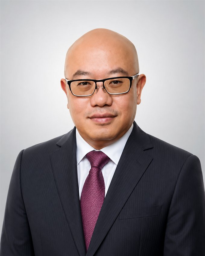 Ronnie Lum — Group Chief Executive Officer